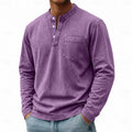 Men's long sleeve henley shirt with a buttoned placket and vintage wash