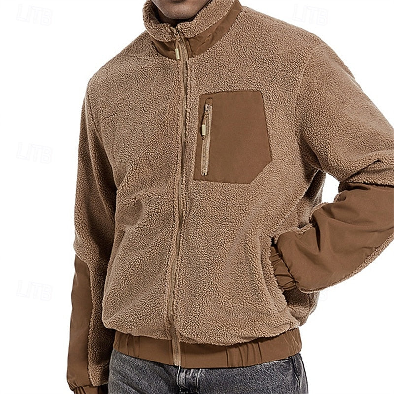 Men's full-zip fleece jacket with a chest pocket and stand collar