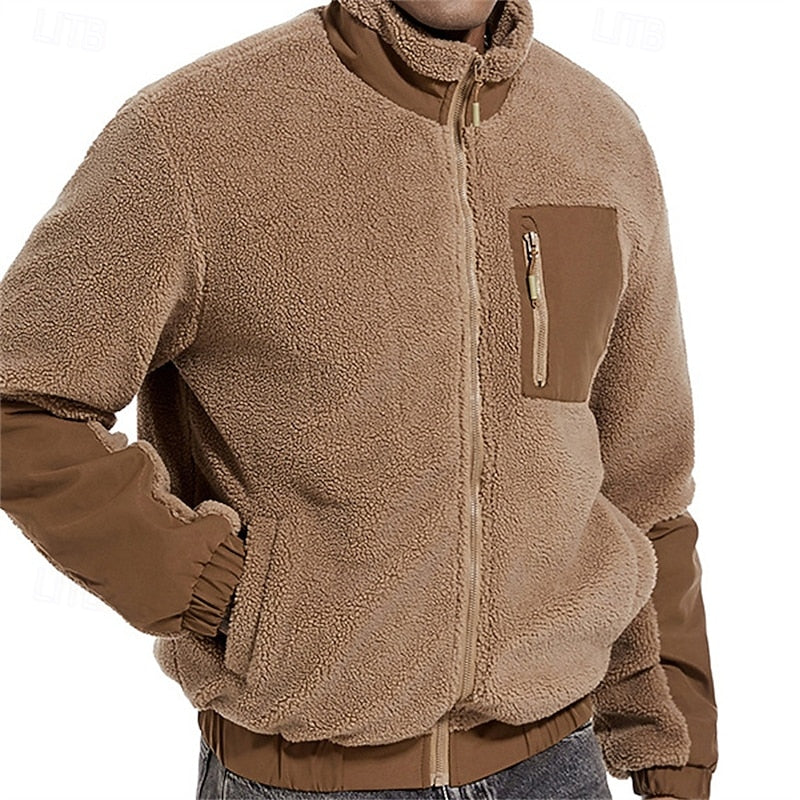 Men's full-zip fleece jacket with a chest pocket and stand collar