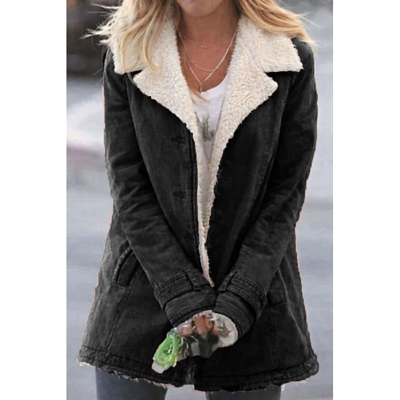 Women's black sherpa-lined coat with turndown collar and button front