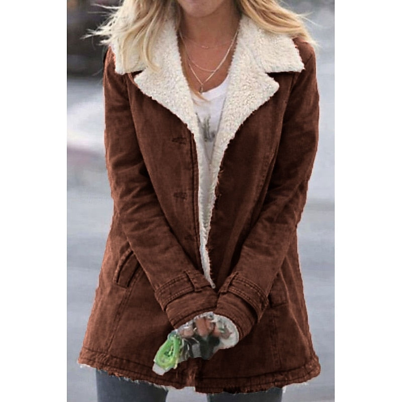 Women's brown sherpa-lined coat with turndown collar and button front