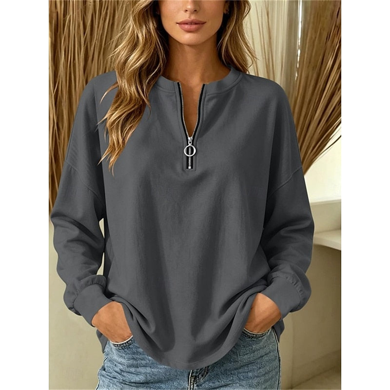 Women's gray half-zip pullover with an adjustable zip neckline