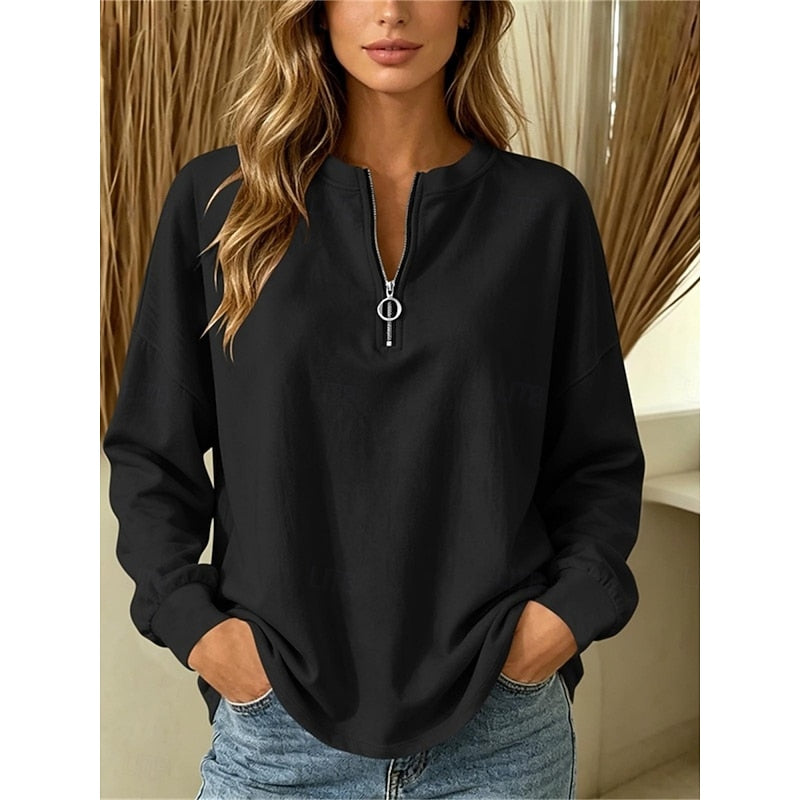 Women's black half-zip pullover in a relaxed, everyday fit