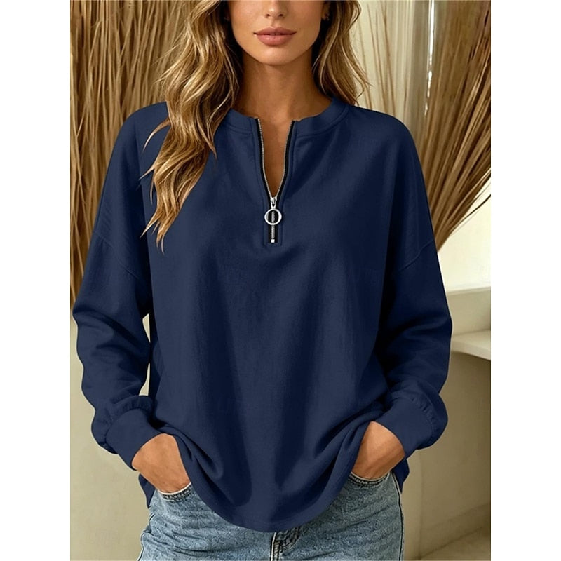 Women's navy half-zip pullover with an adjustable zip neckline