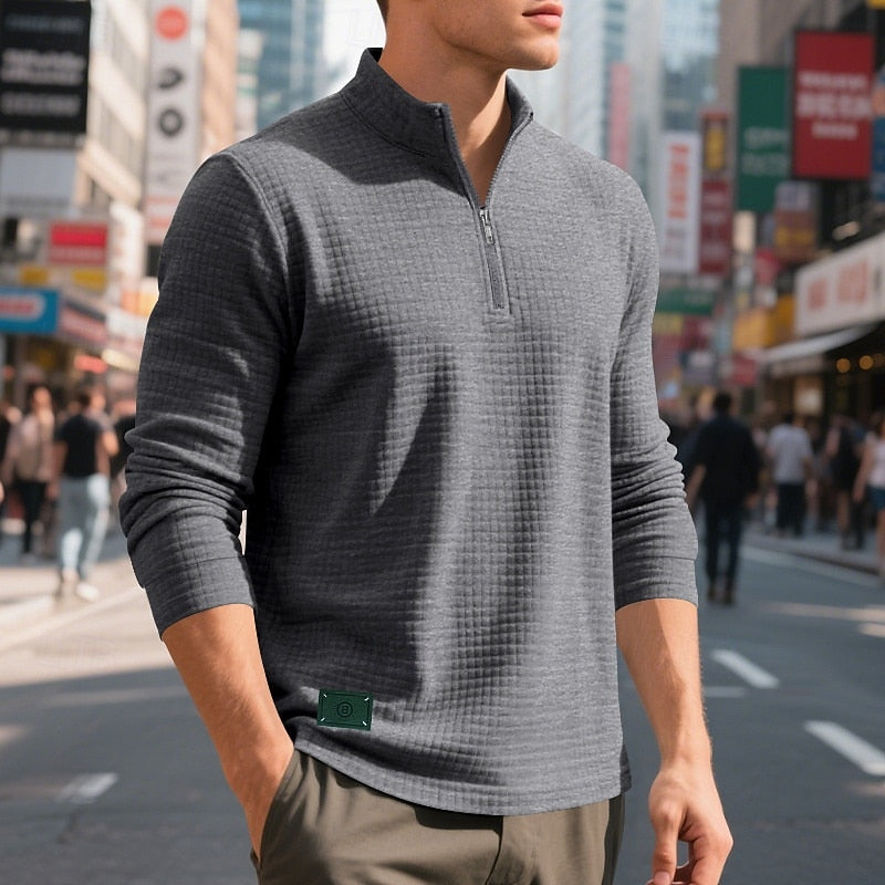 Men's dark gray waffle knit quarter-zip sweatshirt, close view of the zip collar