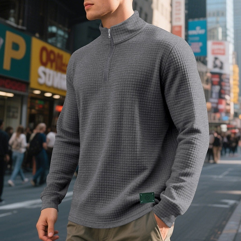 Men's dark gray waffle knit quarter-zip sweatshirt with long sleeves