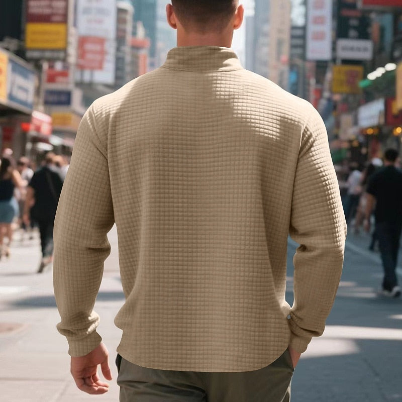 Men's khaki waffle knit quarter-zip sweatshirt with a mock neck