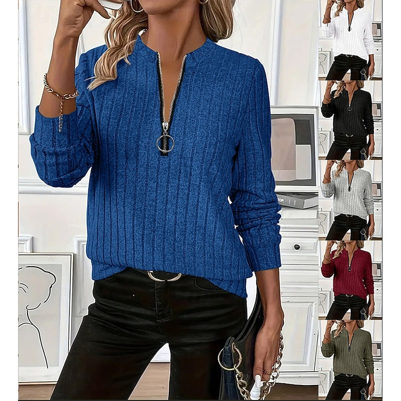 Women's blue ribbed knit top with an adjustable zip neckline