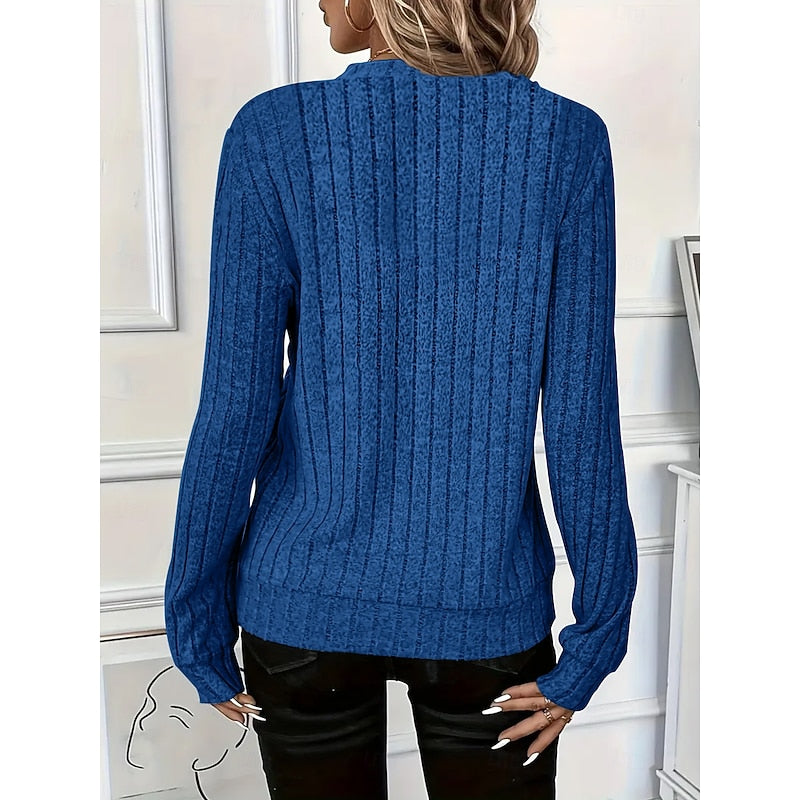 Women's blue ribbed knit top, back view with visible rib texture