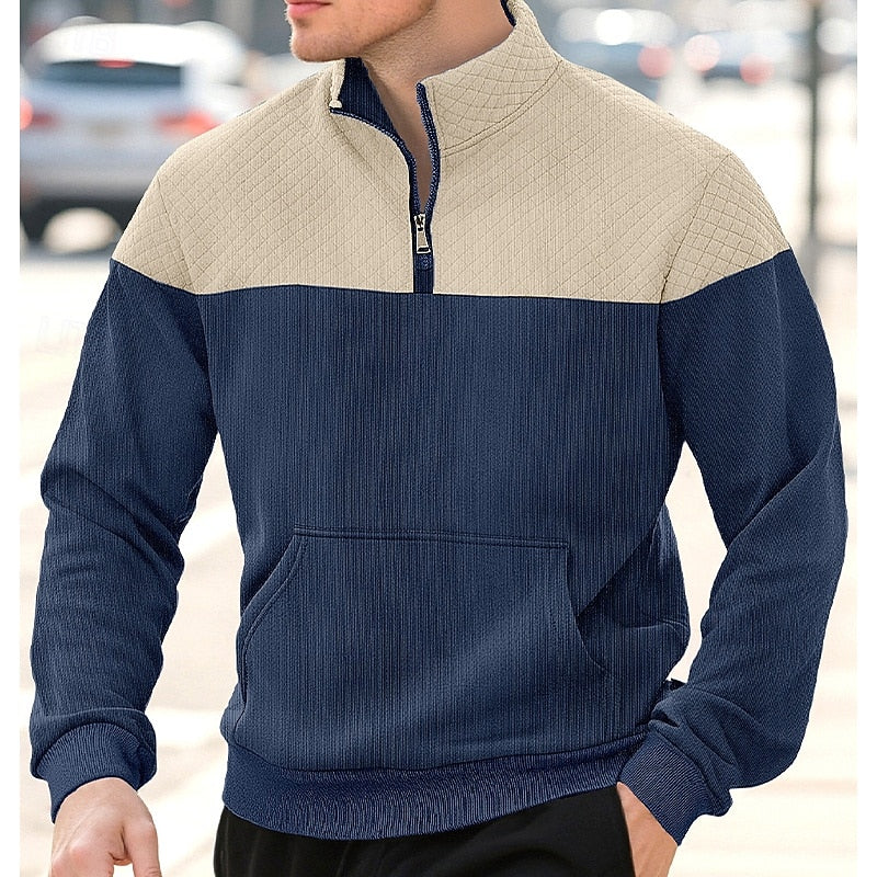 Men's navy blue quarter-zip pullover with quilted color-block collar