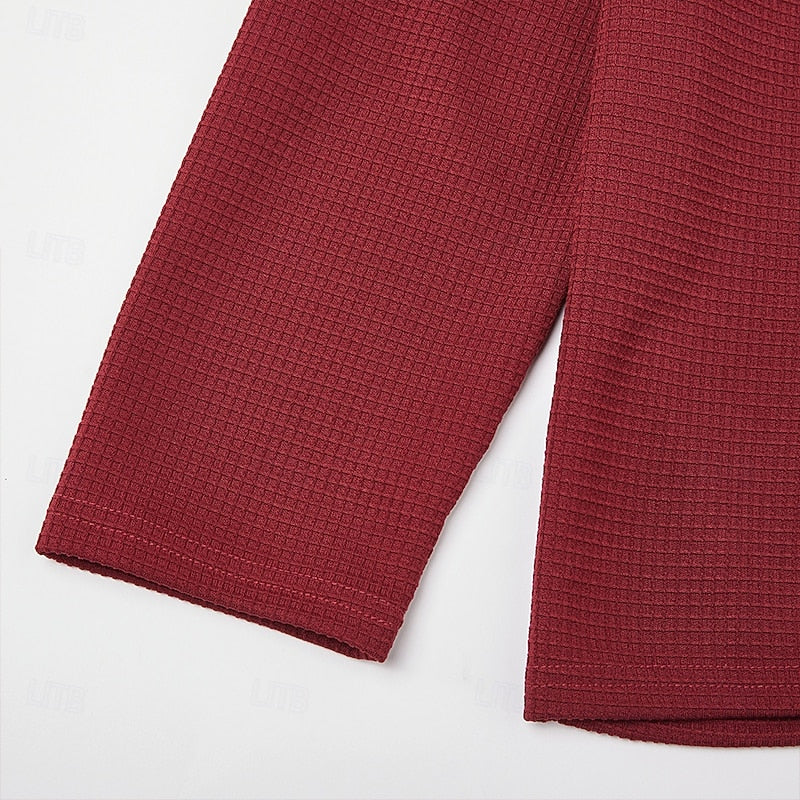Men's wine textured pullover, close-up of ribbed knit cuff