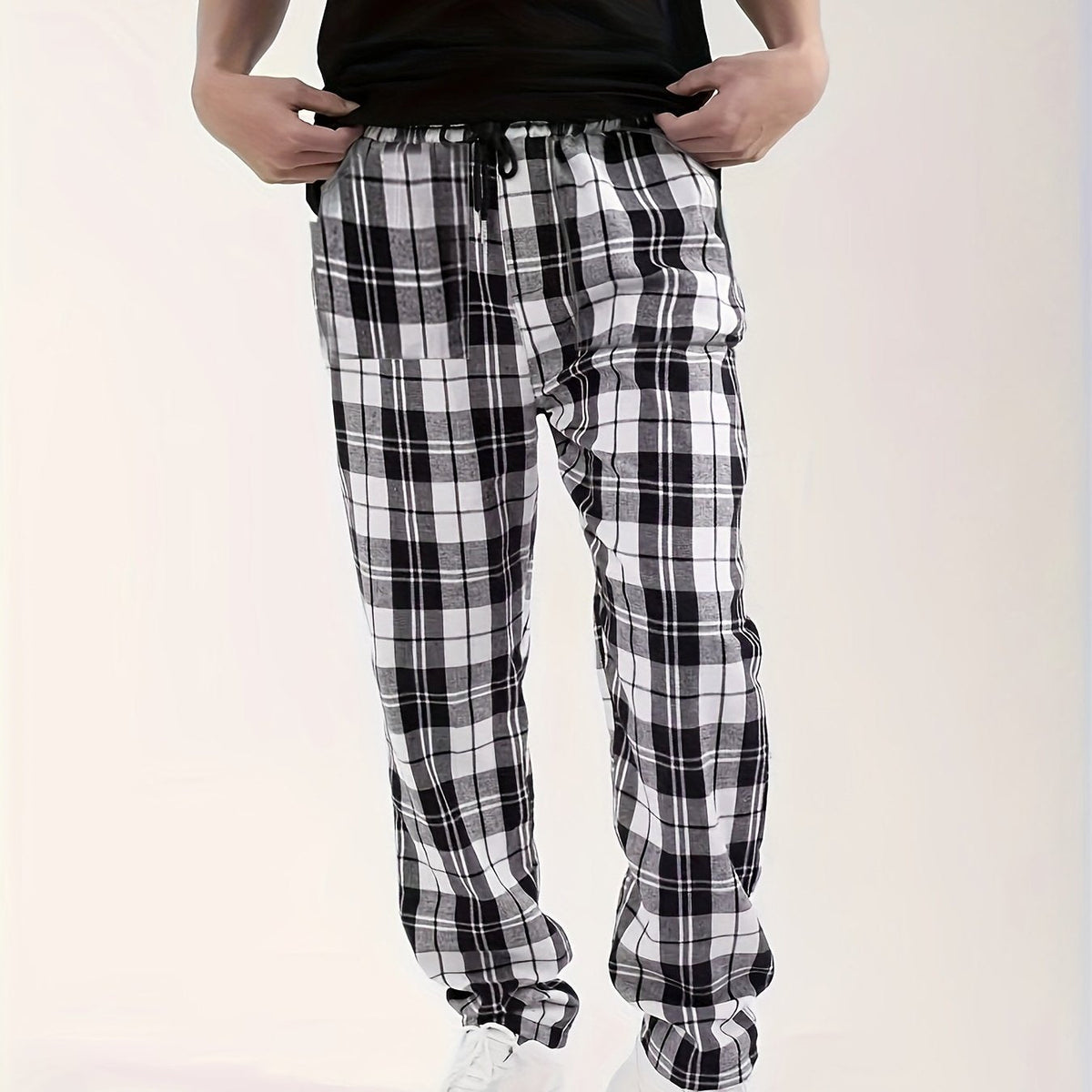 Men's plaid flannel lounge pants with an adjustable drawstring waist