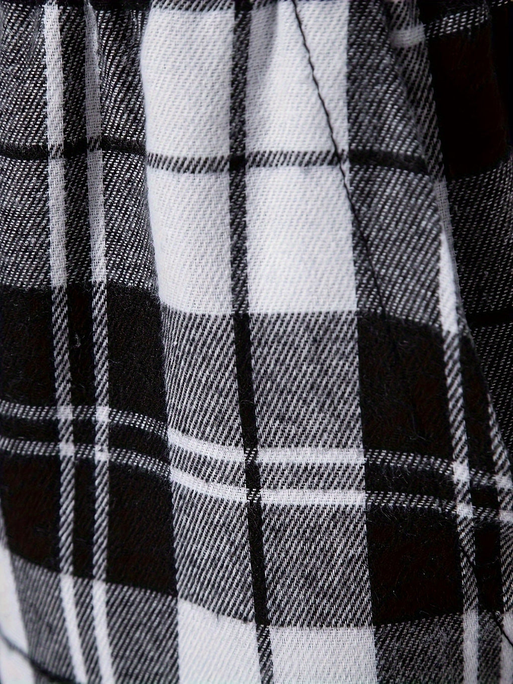 Men's plaid flannel lounge pants with an adjustable drawstring waist