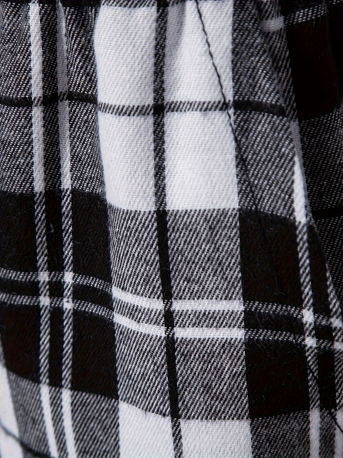 Men's plaid flannel lounge pants with an adjustable drawstring waist