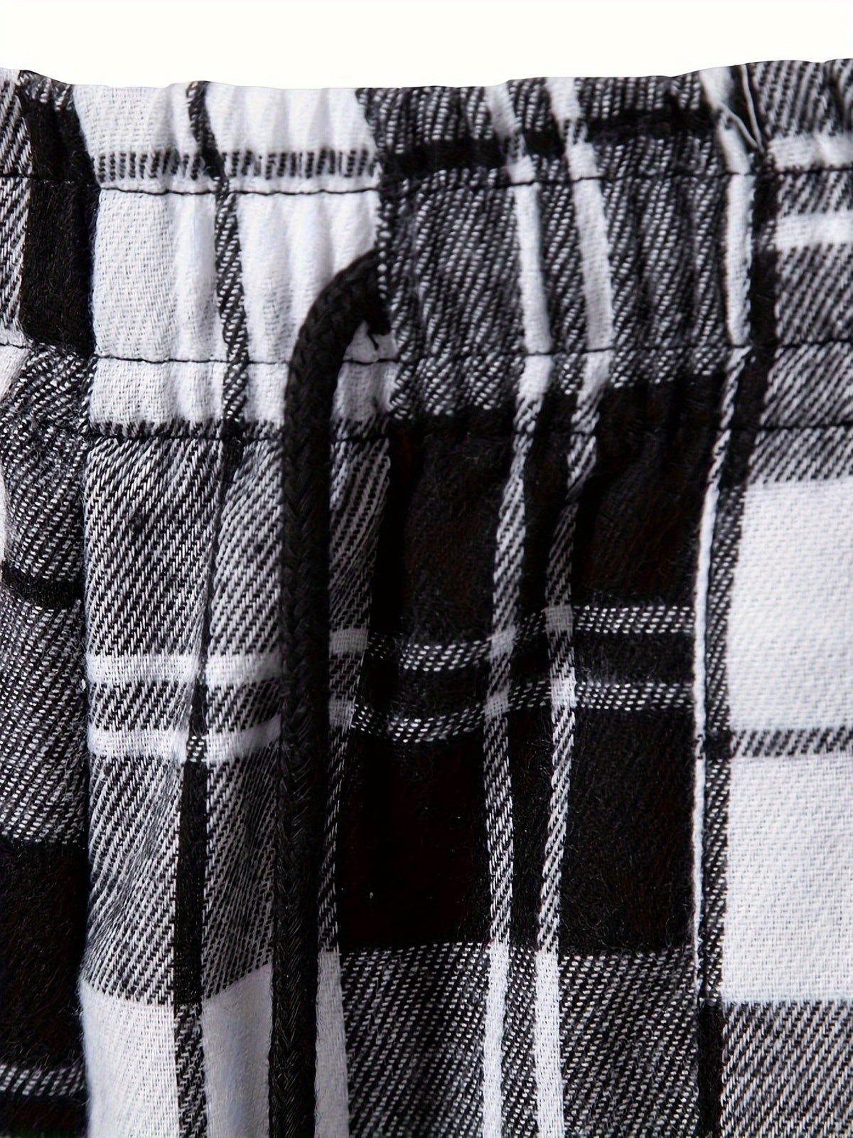 Men's plaid flannel lounge pants with an adjustable drawstring waist
