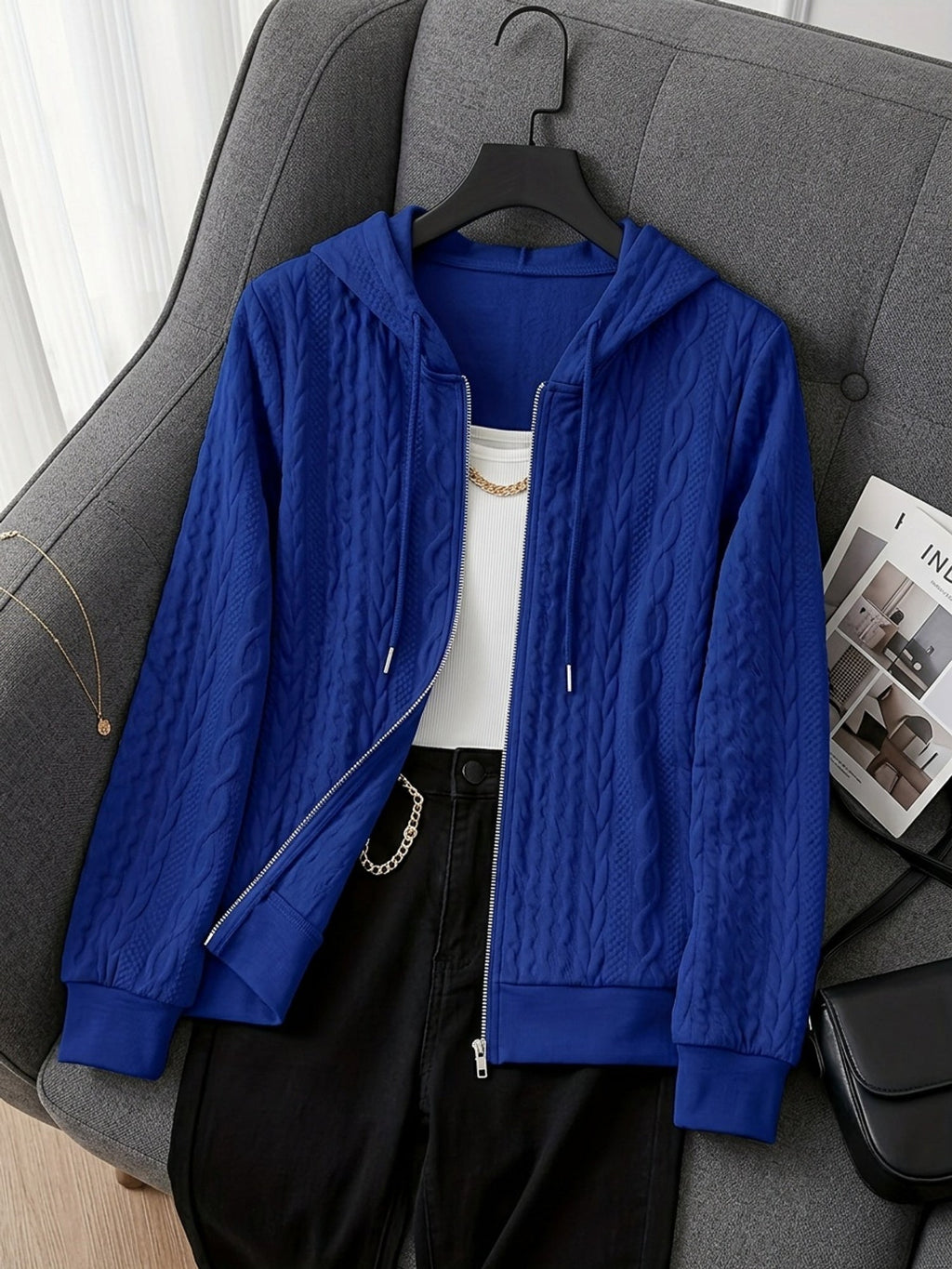 Women's Blue textured zip-up hooded jacket with a relaxed, casual fit