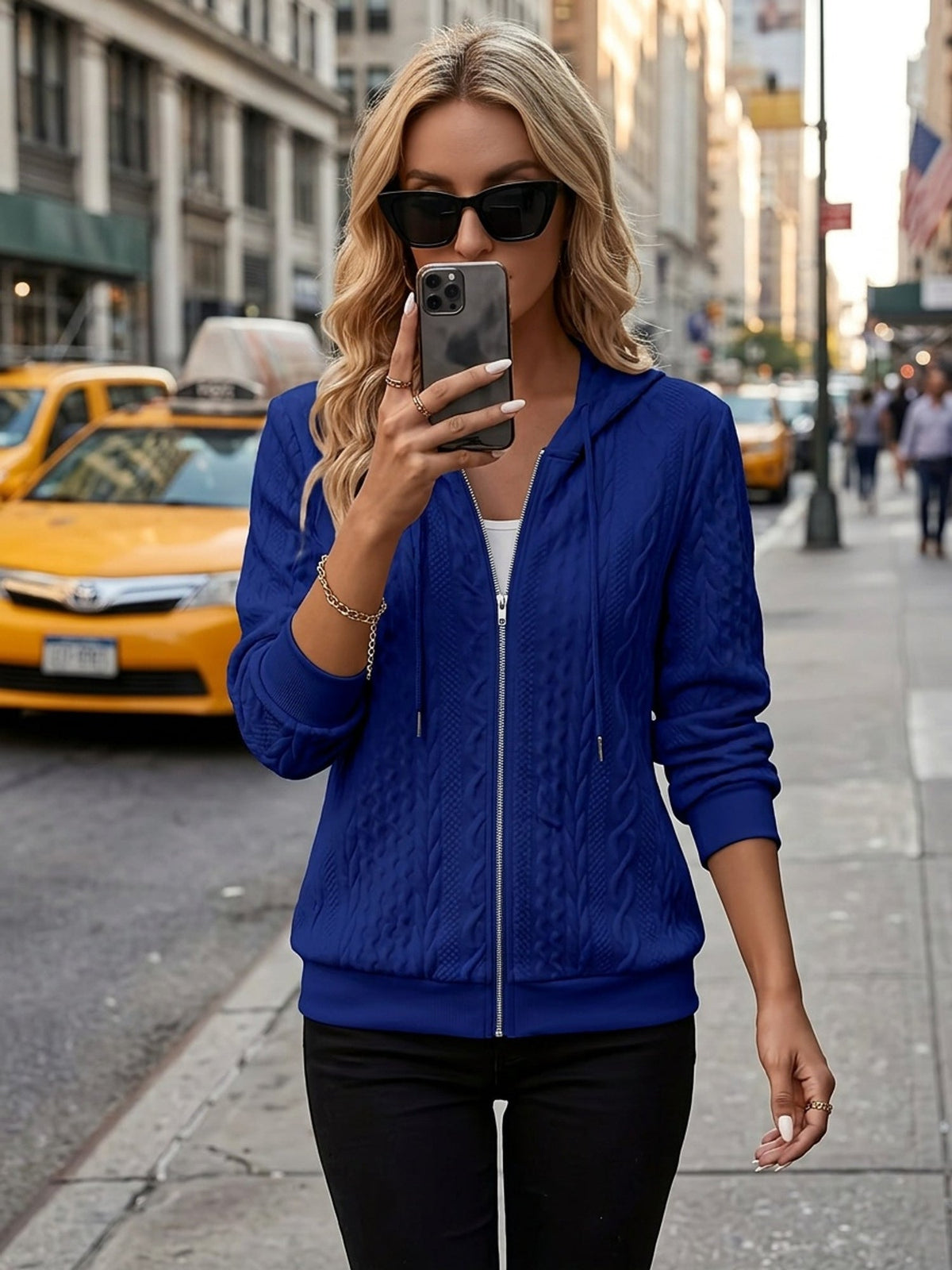 Women's Blue textured zip-up hooded jacket with a relaxed, casual fit
