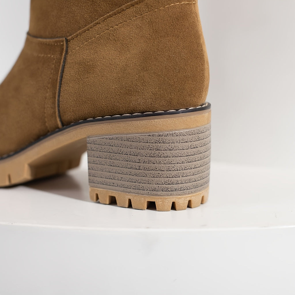 Women's cuffed block heel ankle boots with treaded sole