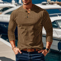 Men's brown ribbed henley shirt with button placket, outdoor shot
