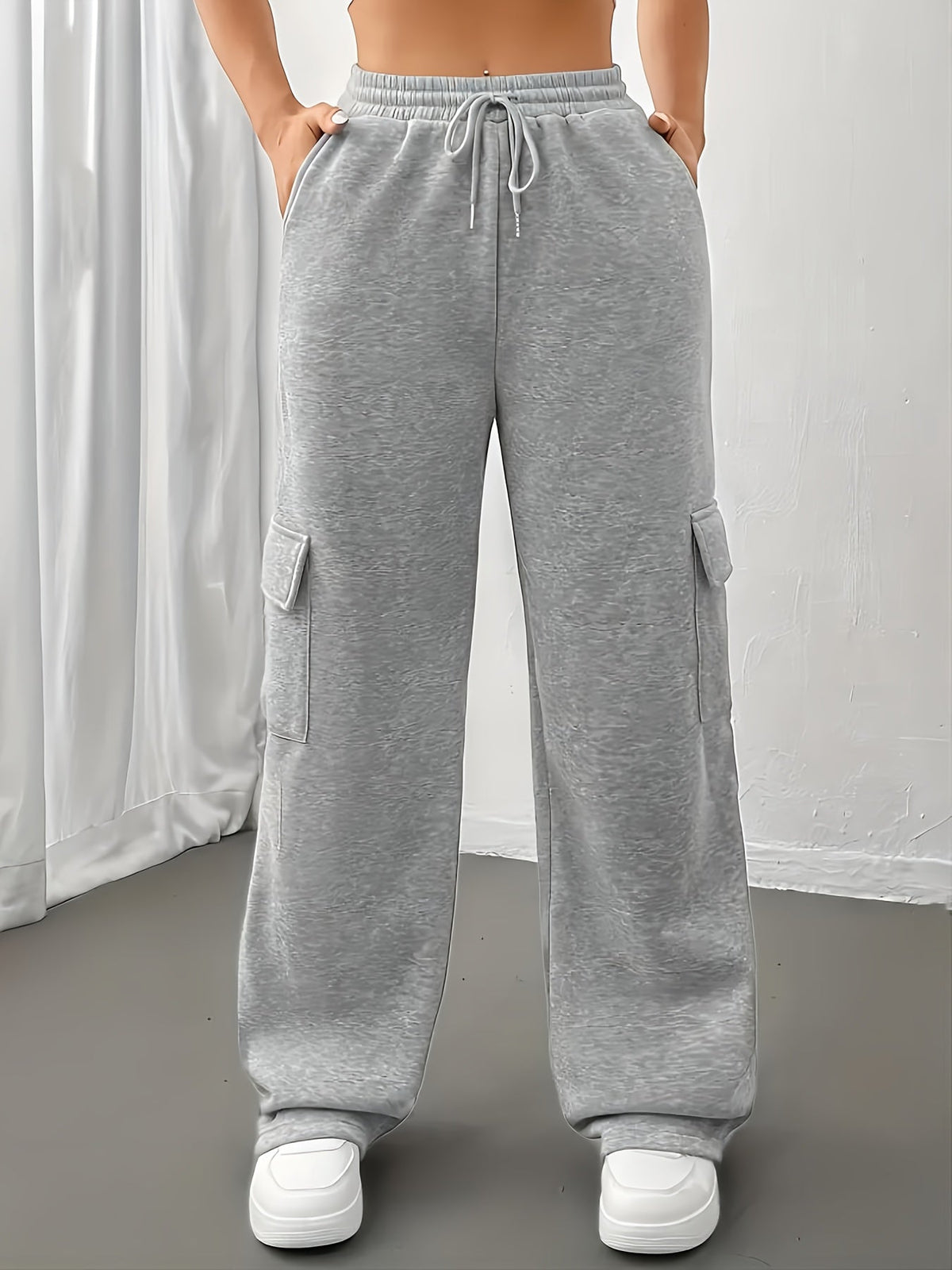 Women's grey cargo joggers, front view with drawstring waist