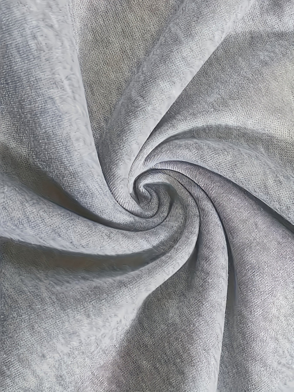 Women's grey cargo joggers, close-up of fleece knit fabric