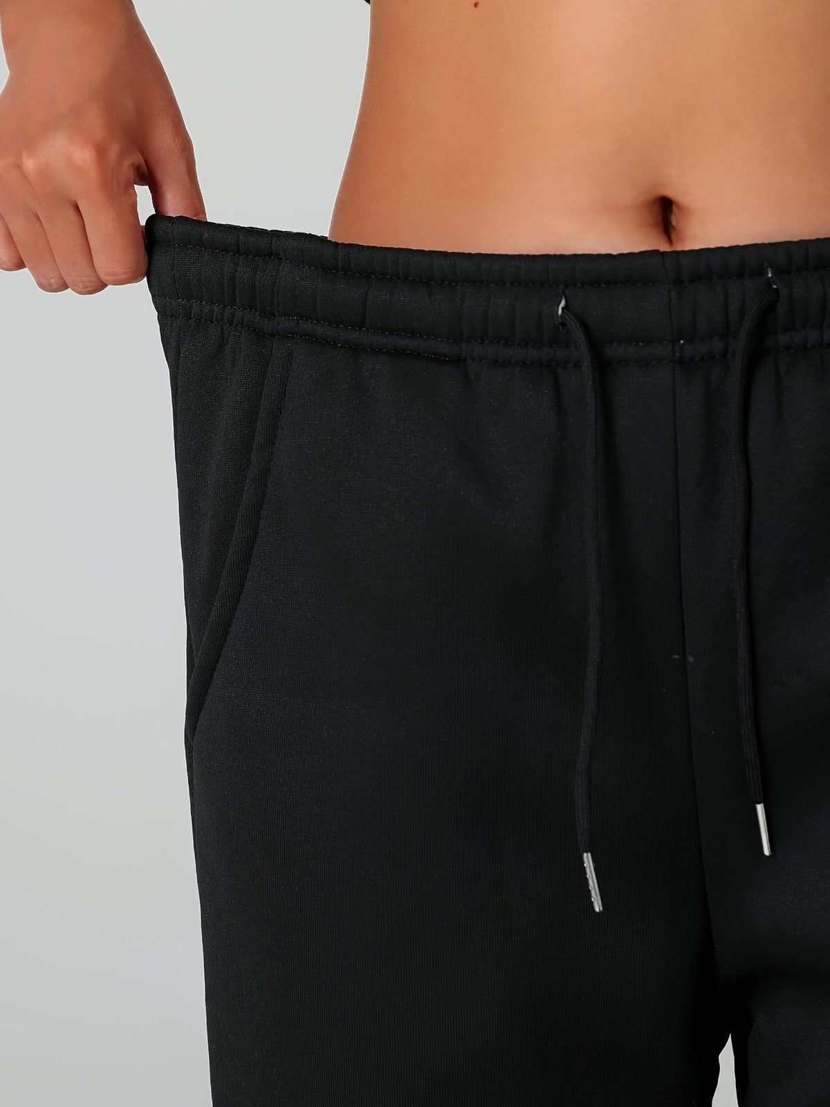 Women's soft-lined cuffed joggers with a drawstring waist and slant pockets