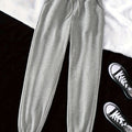 Women's light grey relaxed drawstring joggers with cuffed ankles