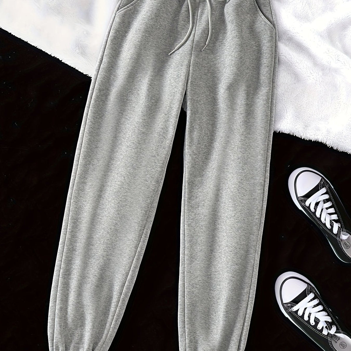 Women's light grey relaxed drawstring joggers with cuffed ankles