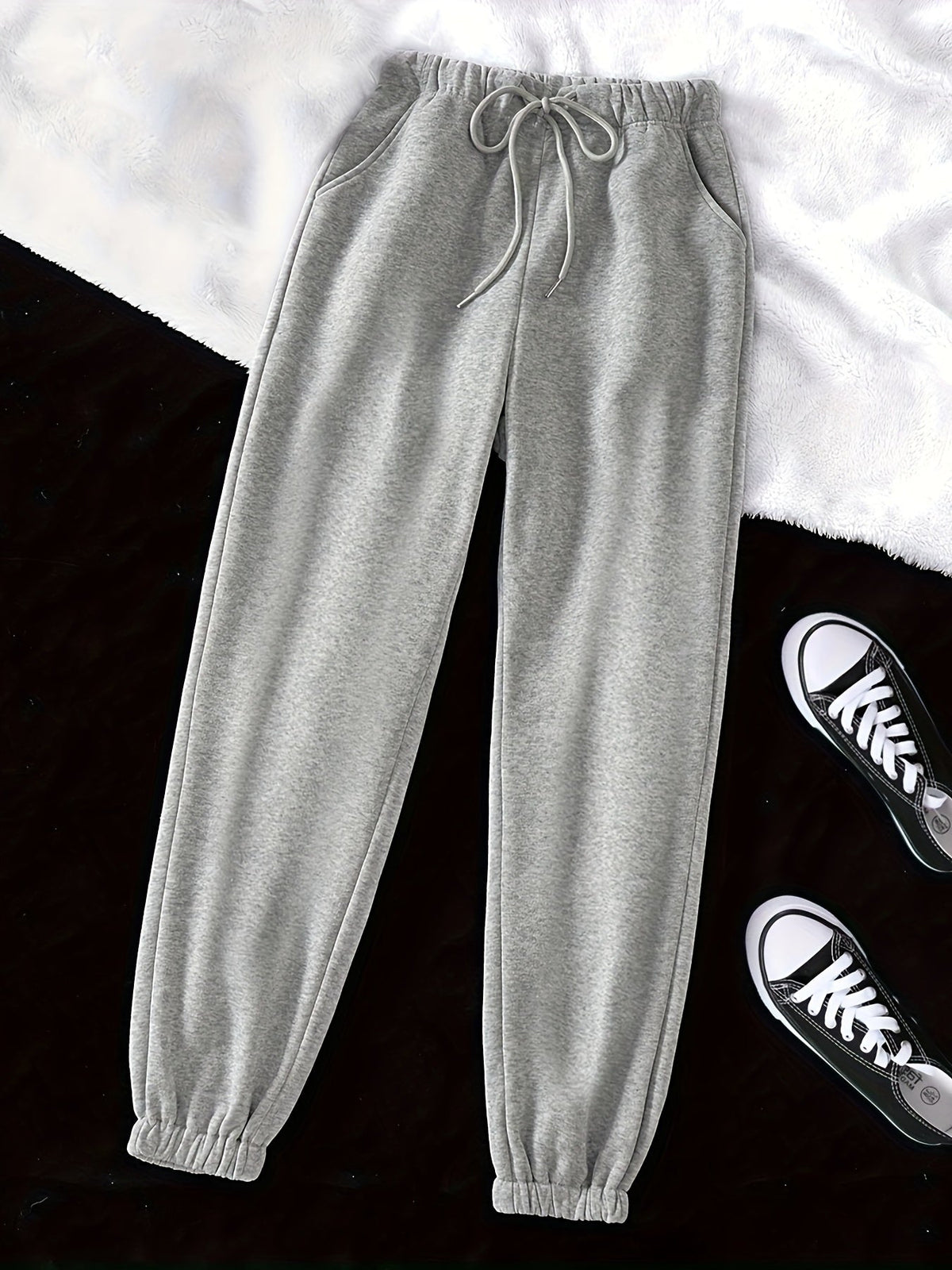 Women's light grey relaxed drawstring joggers with cuffed ankles