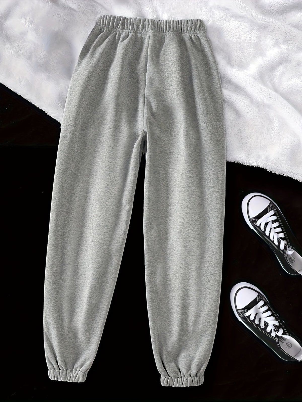 Women's light grey relaxed drawstring joggers with cuffed ankles
