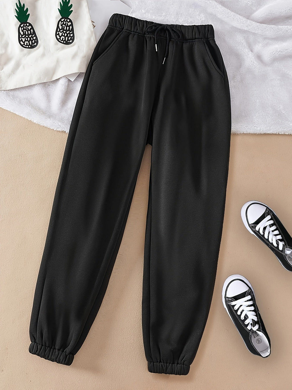 Women's light grey relaxed drawstring joggers with cuffed ankles