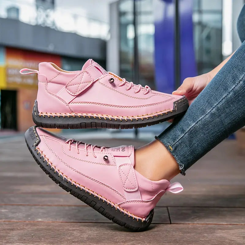 Women's white lace-up casual sneakers with a cushioned sole