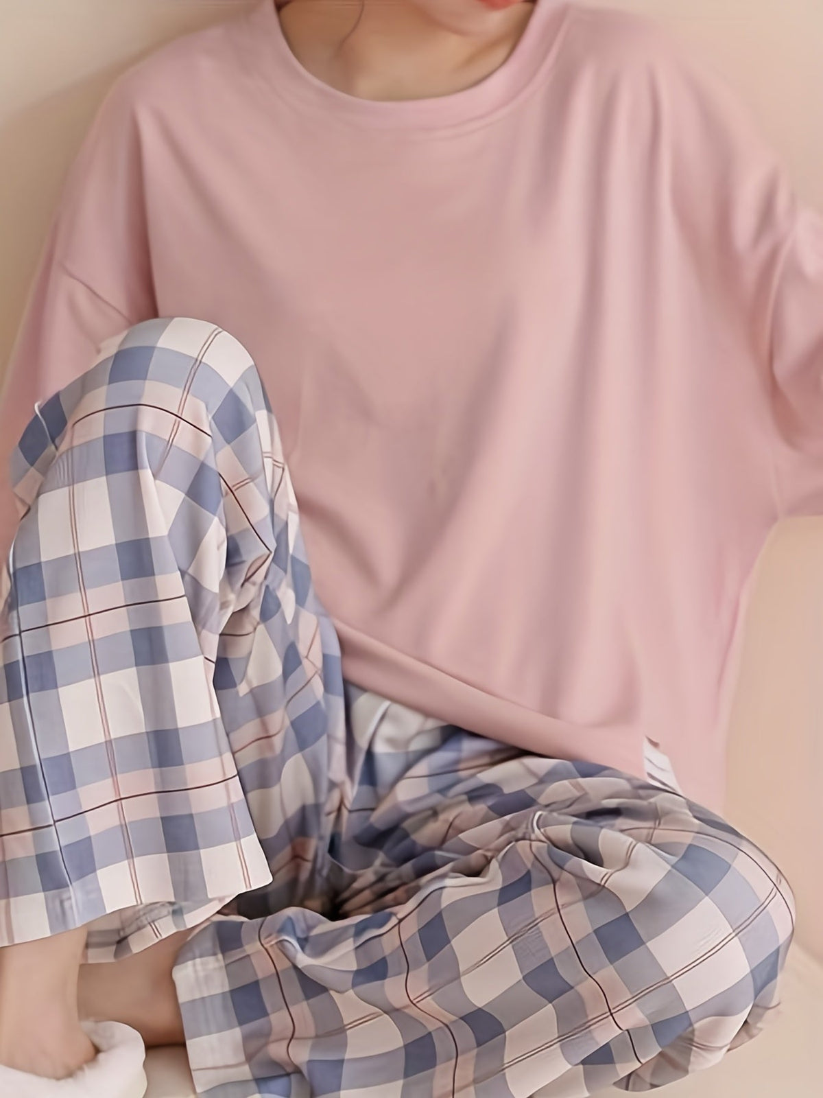 Women's pink two-piece plaid pajama set with long sleeves for fall