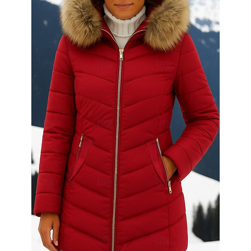Women's hooded quilted puffer jacket with a zip-up front and soft hood
