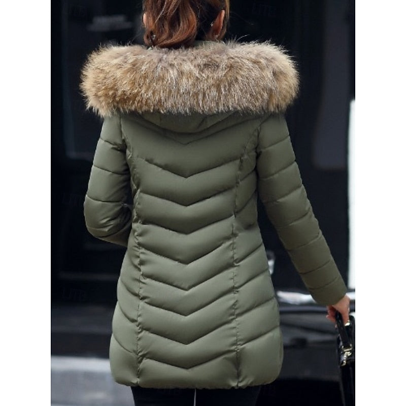 Women's hooded quilted puffer jacket with a zip-up front and soft hood