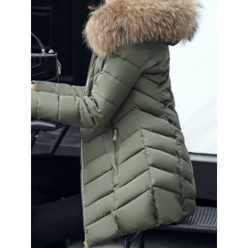 Women's hooded quilted puffer jacket with a zip-up front and soft hood
