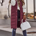 Women's burgundy longline hooded quilted puffer vest with pockets