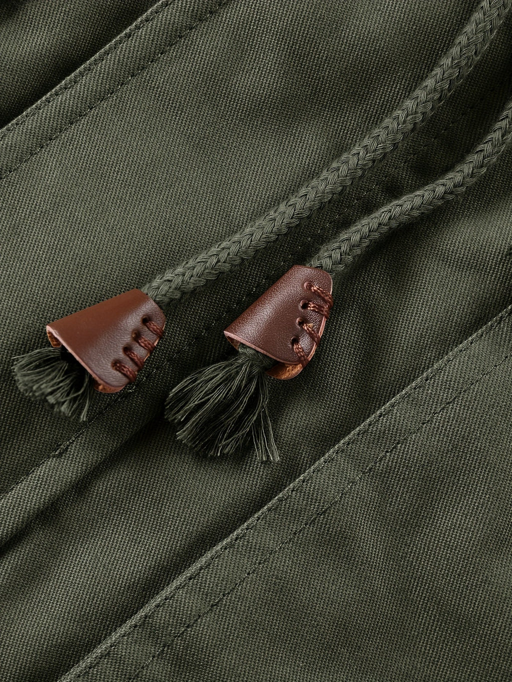 Men's rugged mid-length hooded winter jacket with a plush lining