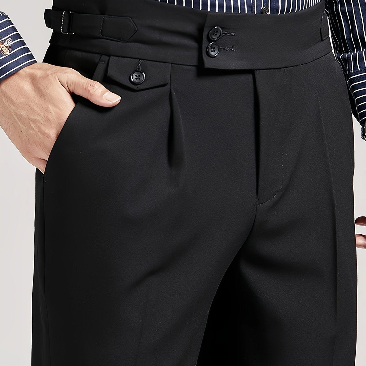 Men's black single-pleat tailored trousers with a high-rise waist