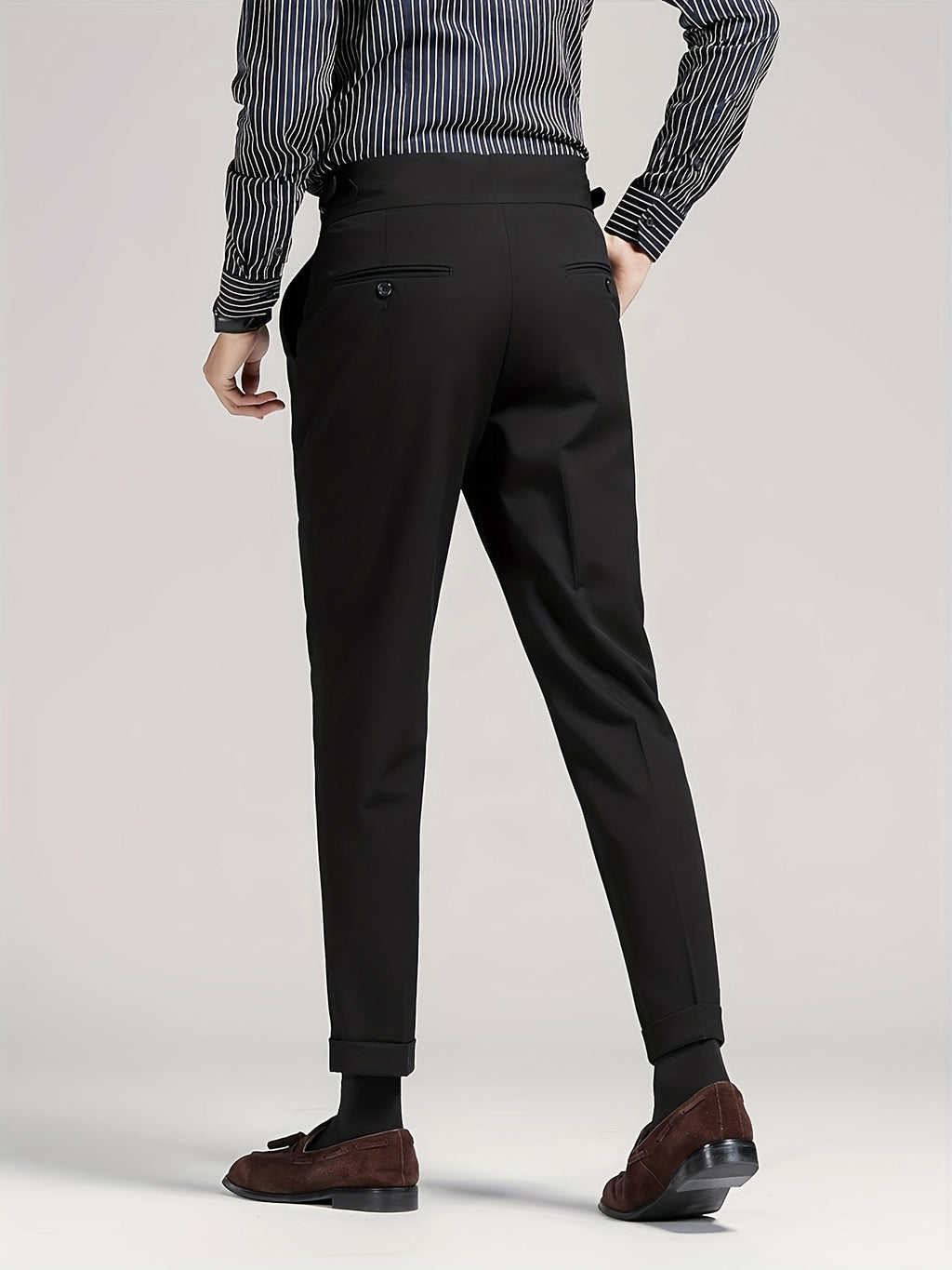 Men's black single-pleat tailored trousers with a high-rise waist