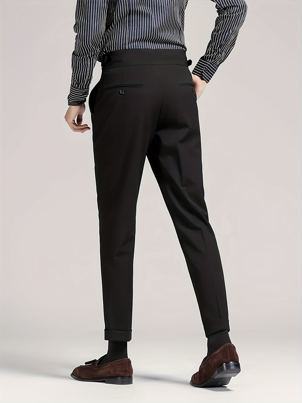 Men's black single-pleat tailored trousers with a high-rise waist