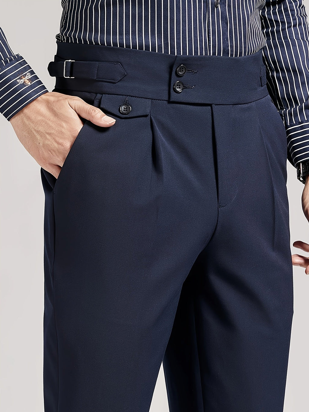 Men's navy single-pleat tailored trousers with a high-rise waist