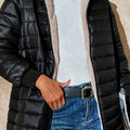 Women's quilted longline coat with a full zip and ribbed cuffs