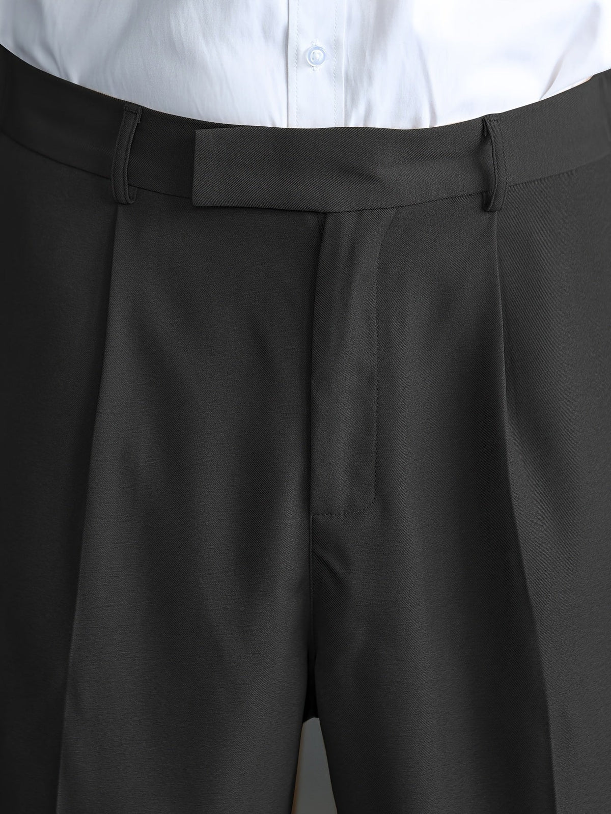 Men's black wide-leg dress trousers with a tailored, relaxed fit