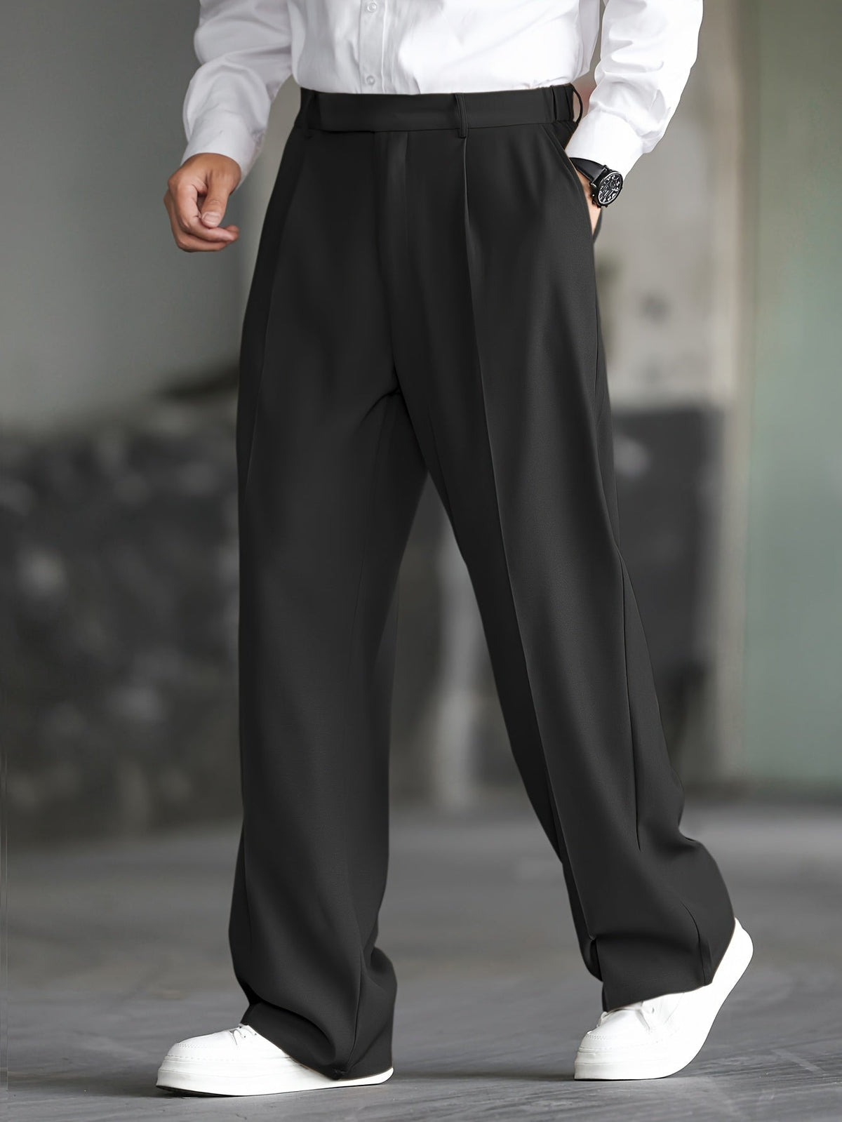 Men's black wide-leg dress trousers with a tailored, relaxed fit
