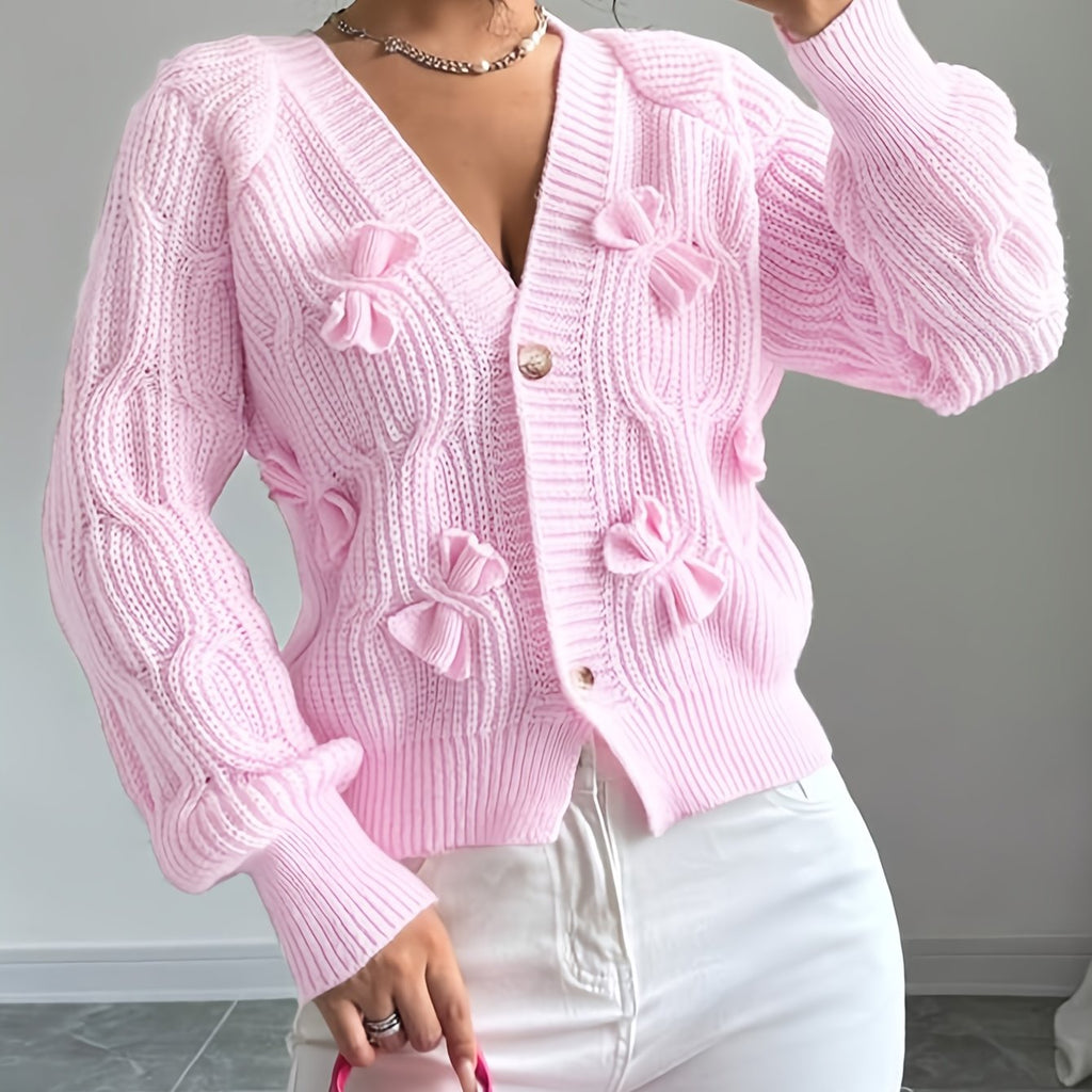 Women's pink bow-detail knit cardigan with a flattering V-neckline