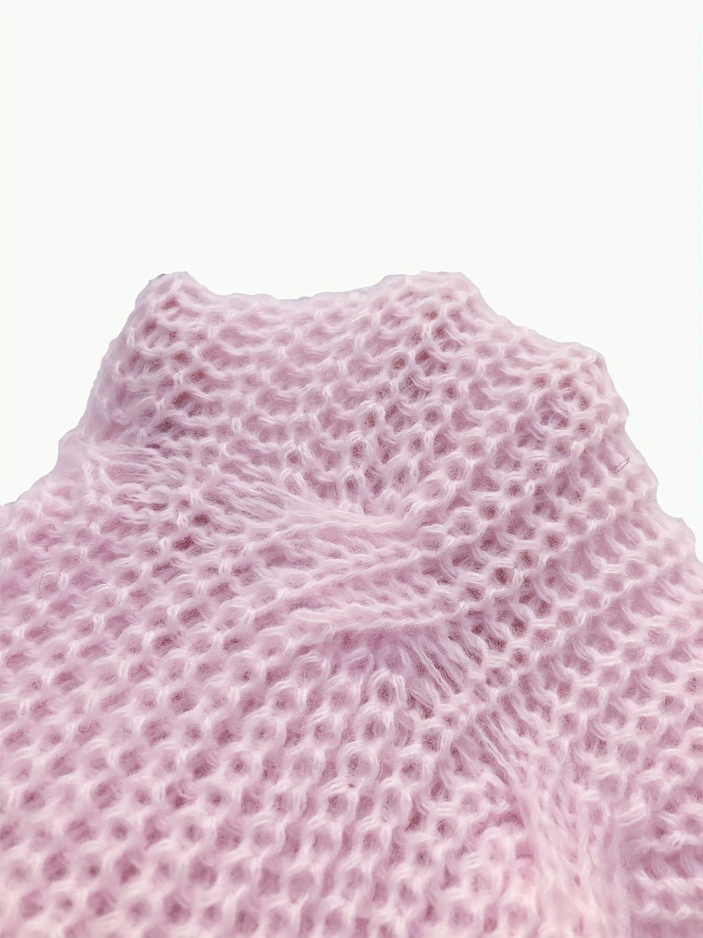 Women's pink bow-detail cardigan with a button-front closure