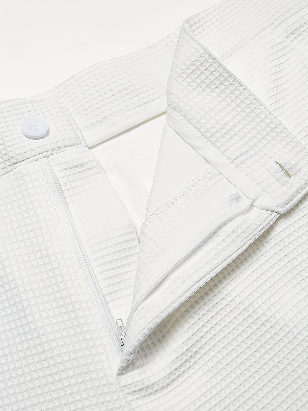 Men's navy straight-leg trousers with a smart textured finish