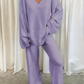 Women's purple fleece loungewear set with a relaxed V-neck top