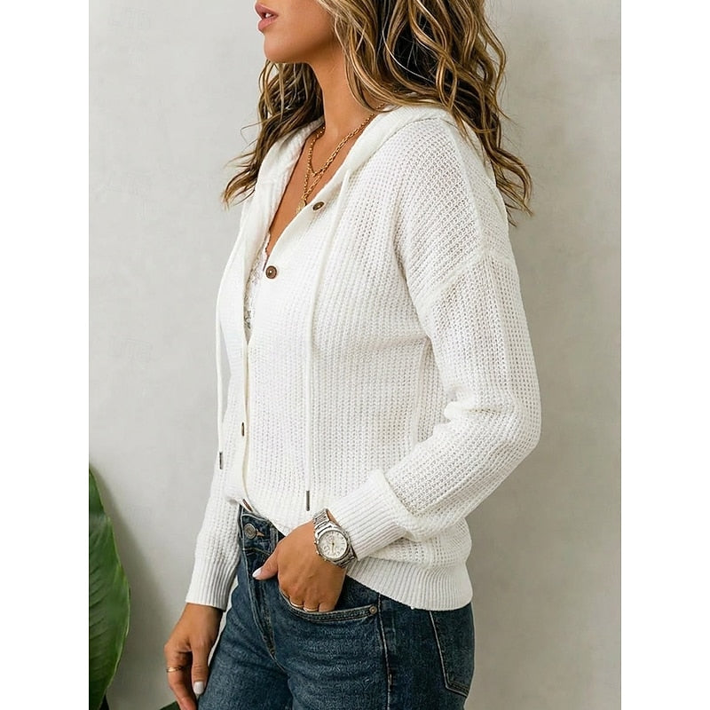 Close-up of the white hooded cardigan's button-front hood